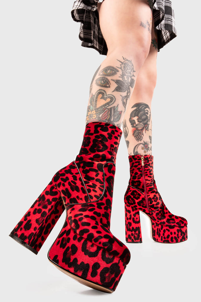 GET WILD WITH IT! 
 
 Adore You Platform Ankle Boots in Red Leopard Print faux suede. These faux suede vegan Platform Ankle Boots feature a Leopard print design and our High Platform sole, making them the only choice to elevate your look! Made with eco-friendly materials and 100% cruelty-free, these boots are as ethical as they are wild!
 
 
 - Platform Height: 2.5 inch
 - Heel Height: 5.5 inch 
 - Mid ankle length 
 - Red zipper
 - High Platform sole
 - Round toe 
 - 100% vegan 
 
 SKU: LMF 0119 - RedLEO