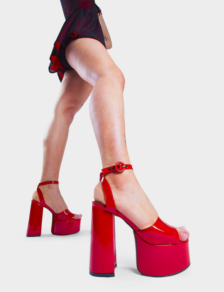 MAKE YOUR STATEMENT 

All For You Platform Sandals in Red Patent. These high heeled vegan Sandals feature an adjustable ankle strap with a Platform sole and high heel, perfect for adding height and glamour to any outfit. Made with eco-friendly materials and 100% cruelty-free, these Sandals are as ethical as they are hot!


- Platform Height: 2.5 inch
- Heel Height: 5.5 inch 
- Open Toe
- Wrap around ankle strap
- O shaped buckle and silver eyelets
- Platform sole
- Round toe 

SKU: LMS 104 REDPAT