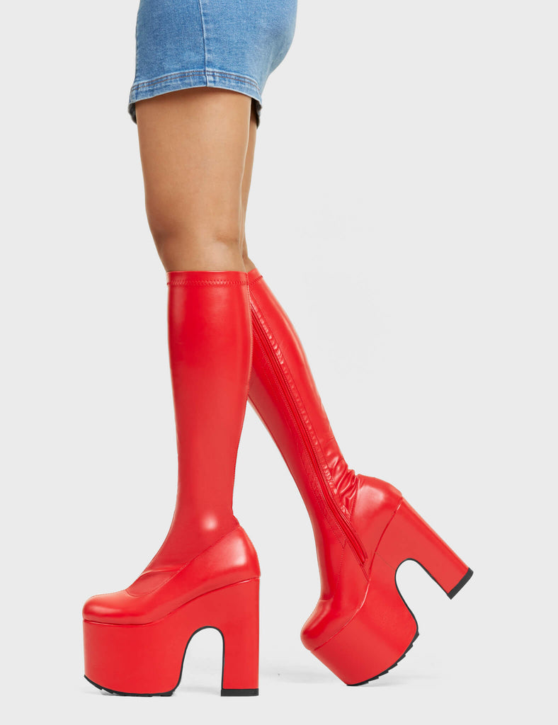 SPLIT PERSONALITY
  
  Awkward Chunky Platform Knee High Boots in Red stretch faux leather. These platform boots feature a minimalist look with a platformed chunky sole. Made with eco-friendly materials and 100% cruelty-free, these platform boots are made to perfection and are as ethical as they are chic.
  
  - Platform Height
  - Knee High Length
  - Fitted Feel
  - Rounded toe
  - Chunky Platform
  - 100% vegan
  
  SKU: LMF 5110 - RedPU