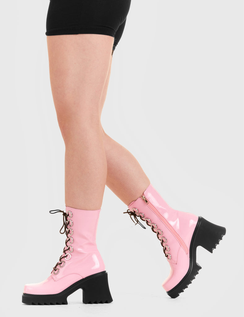 LACED UP
  
  Bulletproof Chunky Platform Ankle Boots in Pink patent. These vegan western Boots feature black laces and a shark teeth grip sole, very chic. Made with eco-friendly materials and 100% cruelty-free, these boots are as ethical as they are edgy!
  
  
  - Chunky Platform
  - Calf length
  - Shark teeth grip
  - black laces
  - Silver eyelets
  - Rounded toe 
  - 100% vegan 
  
  SKU: LMF 3731 - PinkPAT