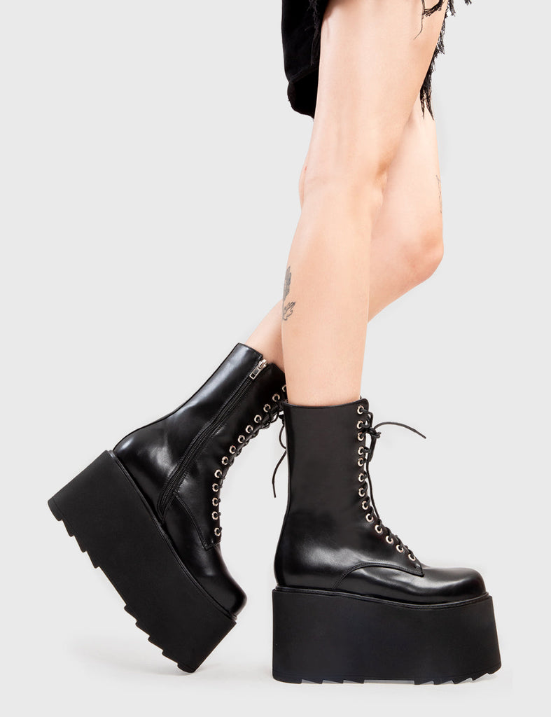 Step Out in Fashion
  
  Steady Chunky Platform Ankle Boots in Black faux leather. These flatform shoes feature a lace-up design, on our flatform sole. Made with eco-friendly materials and 100% cruelty-free, these platform boots are as ethical as they are Edgy
  
  - Platform Height
  - lace-up
  - Flatform Sole
  - Shark's Teeth Grip
  - 100% vegan 
  
  SKU: LMF 3145 - BlackPU