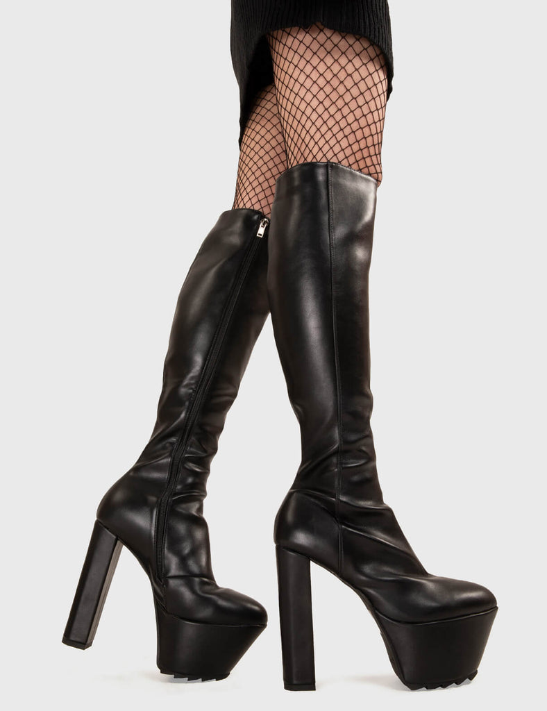 Not Your Basic Boots!
  
  Can't Stand You Platform Knee High Boots in Black faux leather. These platform boots feature a minimalist design with a pointed toe, on our platform sole and high heel. Made with eco-friendly materials and 100% cruelty-free, these platform boots are as ethical as they are eye-catching.
  
  - Platform Height
  - Heel Height
  - Black zip
  - Pointed toe
  - High Heel
  - Platform Sole
  - Shark's Teeth Grip
  - 100% vegan 
  
  SKU: LMF 3116 - BlackPU