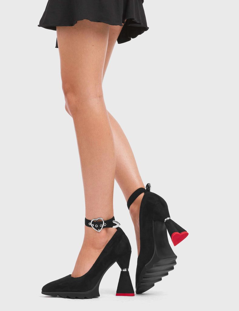 CLASSY N CHIC

Cherished Platform Heels in black faux suede leather. These platform heels feature a flared heel that includes silver ring detailing on the heel, keeping it nice and classy. These heels also feature a heart shaped heel with a red heart at the bottom in addition to a adjustable strap and silver eyelets. Made with 100% vegan materials.

- Platform Height
- Functional Zip
- Flared Heel
- Heart Detail
- Adjustable Strap
- Silver Eyelets
- Silver Ring
- 100% Vegan

SKU: LMF 5400 - BlackSUEDE