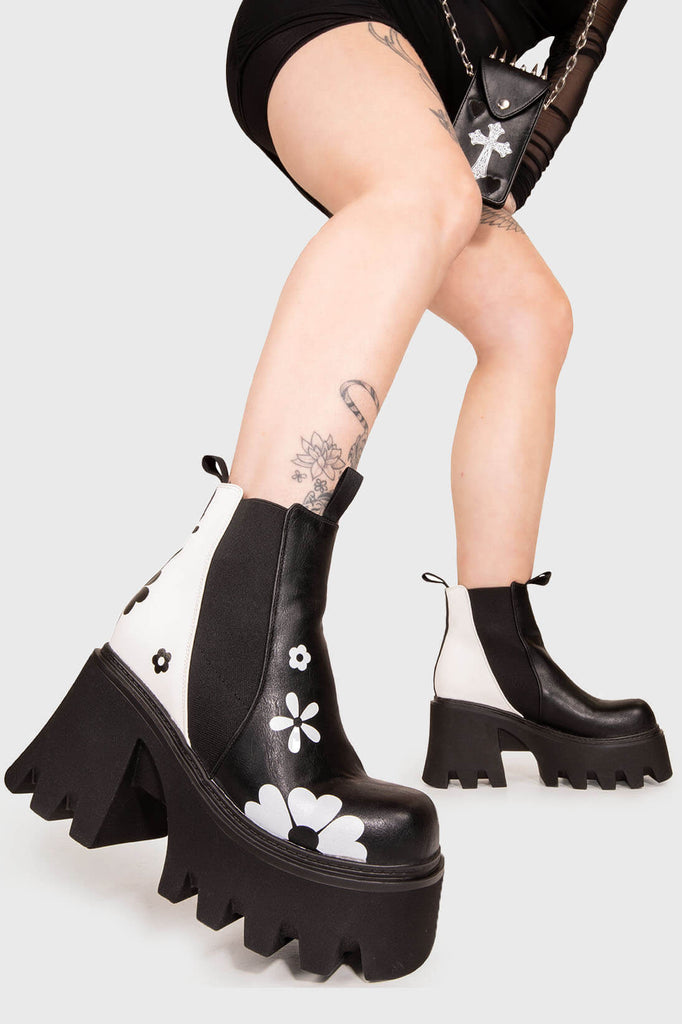 CUTE AF! 

Come Together Chunky Platform Ankle Boots in Black and White faux leather. These vegan Ankle Boots feature an elastic gusset and a Black and White flower print, making them the perfect comfy Boots for any occasion. Made with eco-friendly materials and 100% cruelty-free.


- Platform Height: 3.3 inch 
- Wide ankle friendly
- Wide calf friendly
- Low ankle height
- Black elastic gusset
- Black pull tab
- Chunky Platform sole
- Square toe 
- 100% vegan 

SKU: LMF 1092 - BlackPU/WhitePU