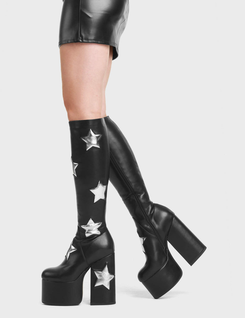 Comet Platform Knee High Boots in Black. These Platform Knee High Boots feature Silver Stars.