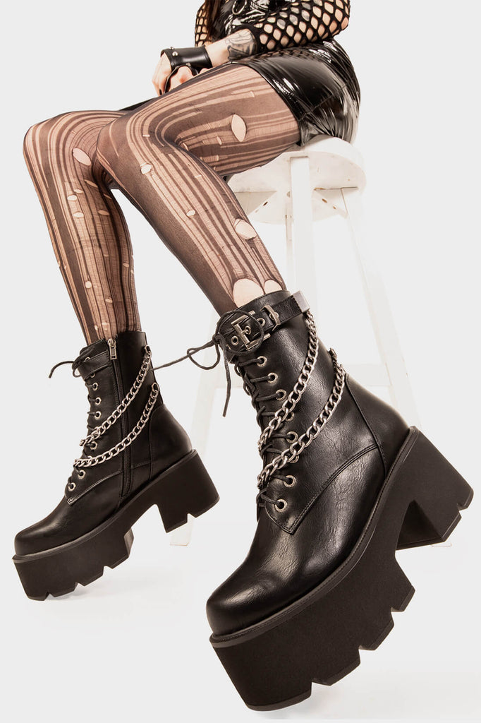 Rise and Shine.

Flip The Switch Chunky Platform Boots in Black faux leather. These Black vegan Platform Boots feature black lace up detail with two hanging chains, from sunrise to sunset slay all day! Made with eco-friendly materials and 100% cruelty-free, these platform boots are as ethical as they are radiant.


- Platform Height: 3 inch
- Black Zipper
- Black Laces
- Silver eyelets
- Silver Chains 
- Black strap silver buckle 
- Chunky Platform sole
- Round Toe
- 100% vegan 

SKU: LMF 1849 - BlackPU