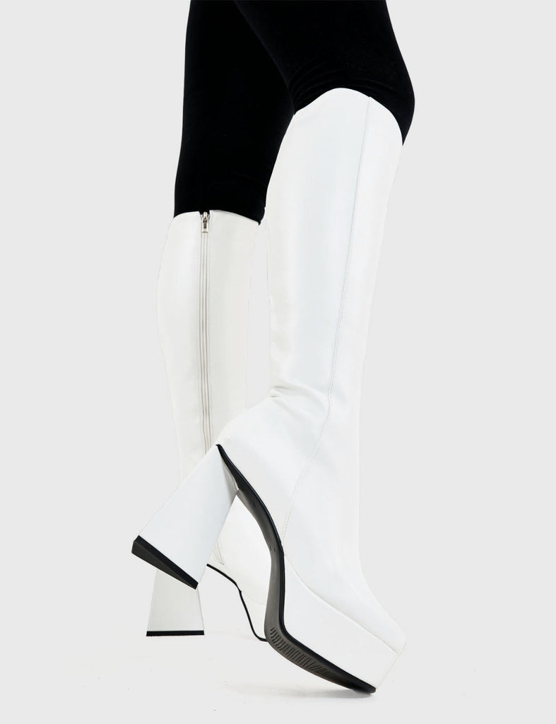 NICE AND SLEEK 
  
  Keepin' It Classy Platform Knee High Boots in White faux leather. These platform boots feature a minimalist look with a triangle heel. Made with eco-friendly materials and 100% cruelty-free, these platform boots are as ethical as they are chic.
  
  - Platform Height
  - Knee highlength
  - Triangle heel
  - High Heel
  - 100% vegan 
  
  SKU: LMF 3340 - WhitePU