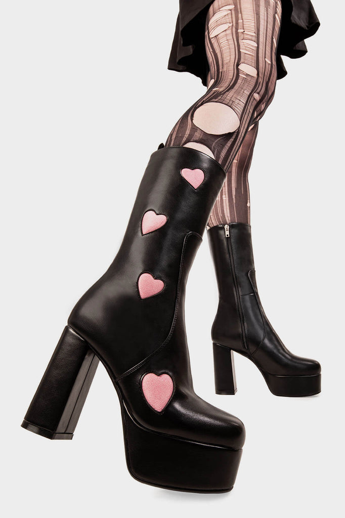 LOVE AT FIRST SIGHT

Game Of Love Platform Calf Boots in Black faux leather. These Black vegan Boots feature our ICONIC Pink faux suede hearts and Platform sole and heel, perfect for adding height and style to any outfit. Made with eco-friendly materials and 100% cruelty-free, these boots are as ethical as they are cute!


- Platform Height: 1.25 inch
- Heel Height: 4.2 inch
- Calf High length
- Pink Hearts
- Black zipper 
- Platform sole
- Round Toe
- 100% vegan 

SKU: LMF 1213 - BlackPU/PinkHeart