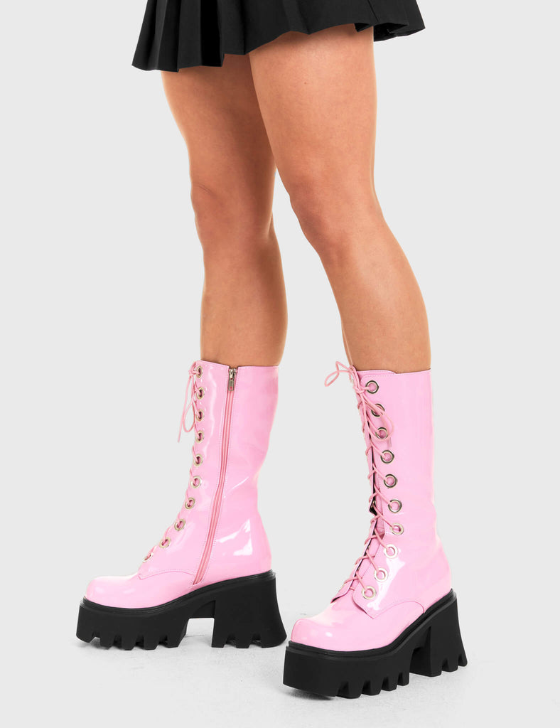THESE BOOTS ARE MADE FOR WALKING
  
  Get Paid Chunky Platform Calf Boots in Pink patent. These vegan western Boots feature a pink lace up boot with silver round eyelets , very classy. Made with eco-friendly materials and 100% cruelty-free, these boots are as ethical as they are edgy!
  
  
  - Chunky Platform
  - Calf length
  - Lace up
  - Silver round eyelets
  - Rounded toe 
  - 100% vegan 
  
  SKU: LMF 3605 - PinkPAT