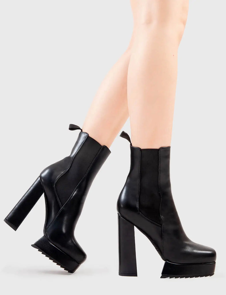 Better Than Basic
  
  Hackers Platform Ankle Boots in Black faux leather. These platform boots feature a minimalist design with a stretchy gusset and pull tag, the perfect boots with any outfit. Made with eco-friendly materials and 100% cruelty-free, these platform boots are as ethical as they are Iconic!
  
  - Platform Height
  - Heel Height
  - Gusset and Pull Tag 
  - Ankle length
  - Shark's teeth grip
  - Platform sole
  - 100% vegan 
  
  SKU: LMF 2835 - BlackPU