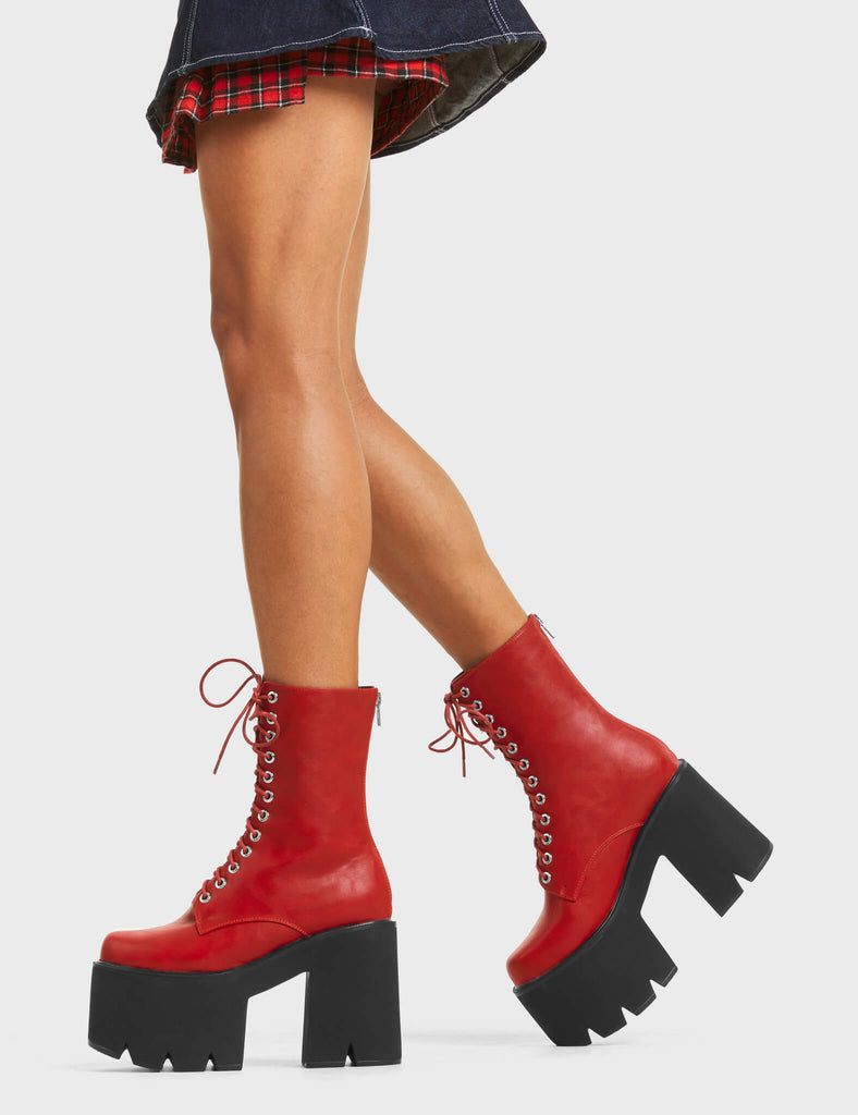 A WONDER
  
  Iconic Chunky Platform Ankle Boots in Dark Red faux leather. These platform boots feature a lace-up design with a functional back zip, the perfect way to elevate any outfit. Made with eco-friendly materials and 100% cruelty-free, these platform boots are as ethical as they are eye-catching.
  
  - Platform Height
  - Heel Height
  - Lace Up
  - Silver Eyelets
  - Back Zip
  - Chunky Platform Sole
  - 100% vegan
  
  SKU: LMF 5015 - DarkRedPU