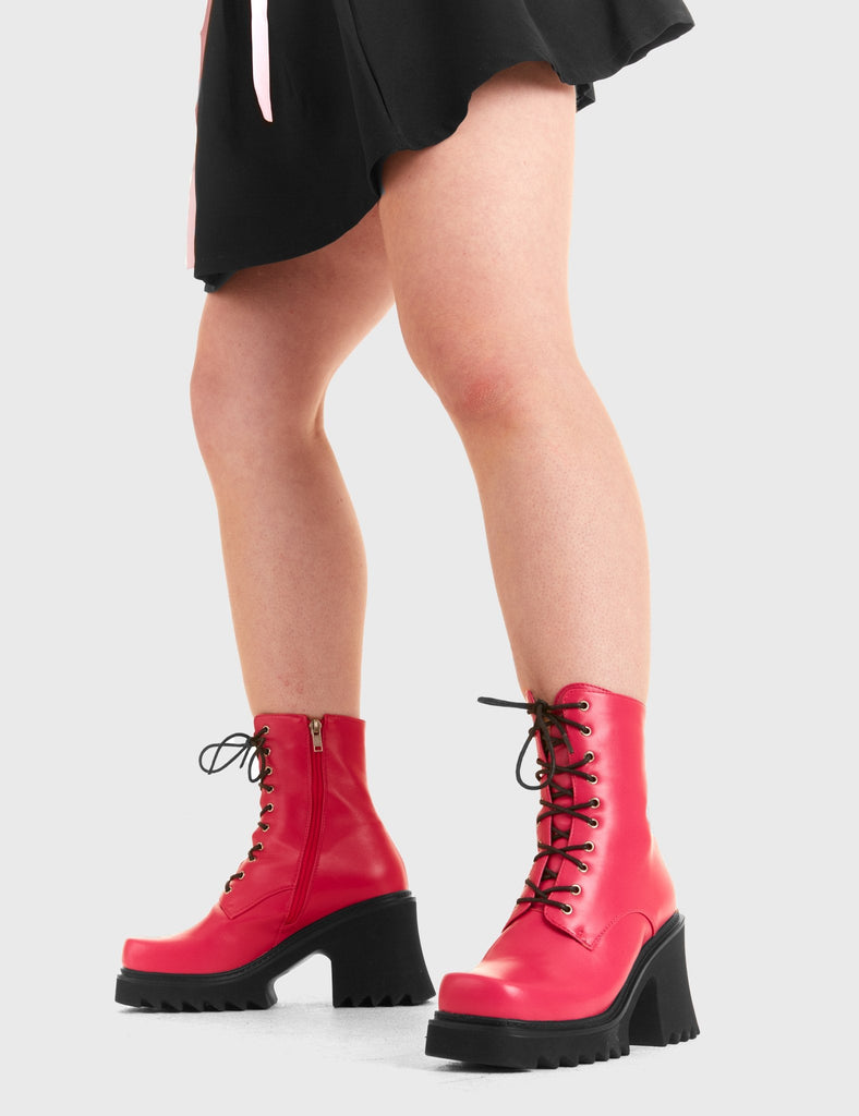 ON A HIGH
  In Opposition Chunky Platform Ankle Boots in Fuchsia faux leather. These vegan western Boots feature black laces and a shark teeth grip sole, very chic. Made with eco-friendly materials and 100% cruelty-free, these boots are as ethical as they are edgy!
  
  
  - Chunky Platform
  - Calf length 
  - Shark teeth grip
  - Black laces
  - Rounded toe 
  - 100% vegan 
  
  SKU: LMF 3729 - FuchsiaPU