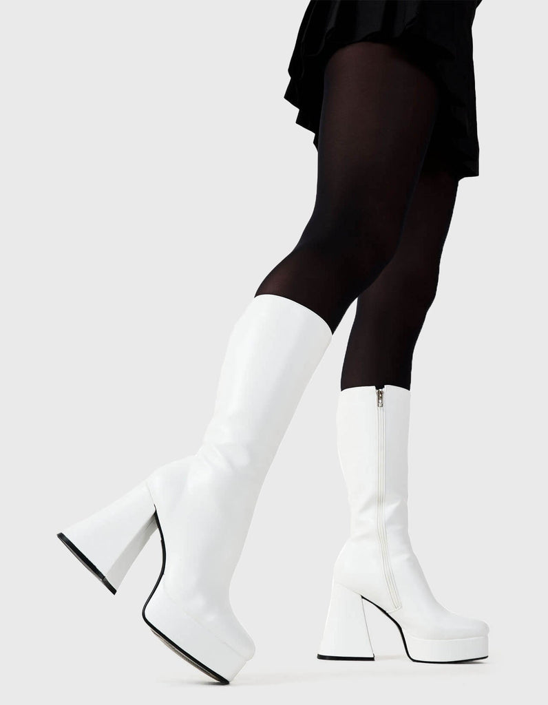 Obsessed
  
  Infatuation Platform Calf Boots in White faux leather. These white vegan Platform Boots feature on our platform sole, walking on platform dreams.Made with eco-friendly materials and 100% cruelty-free, these platform boots are as ethical as they are sexy.
  
  
  - Platform Height: 2.6 inch
  - Heel Height: 5.5 inch
  - Calf High length
  - White Zipper
  - Platform sole
  - Flared heel
  - Round Toe
  - 100% vegan 
  
  SKU: