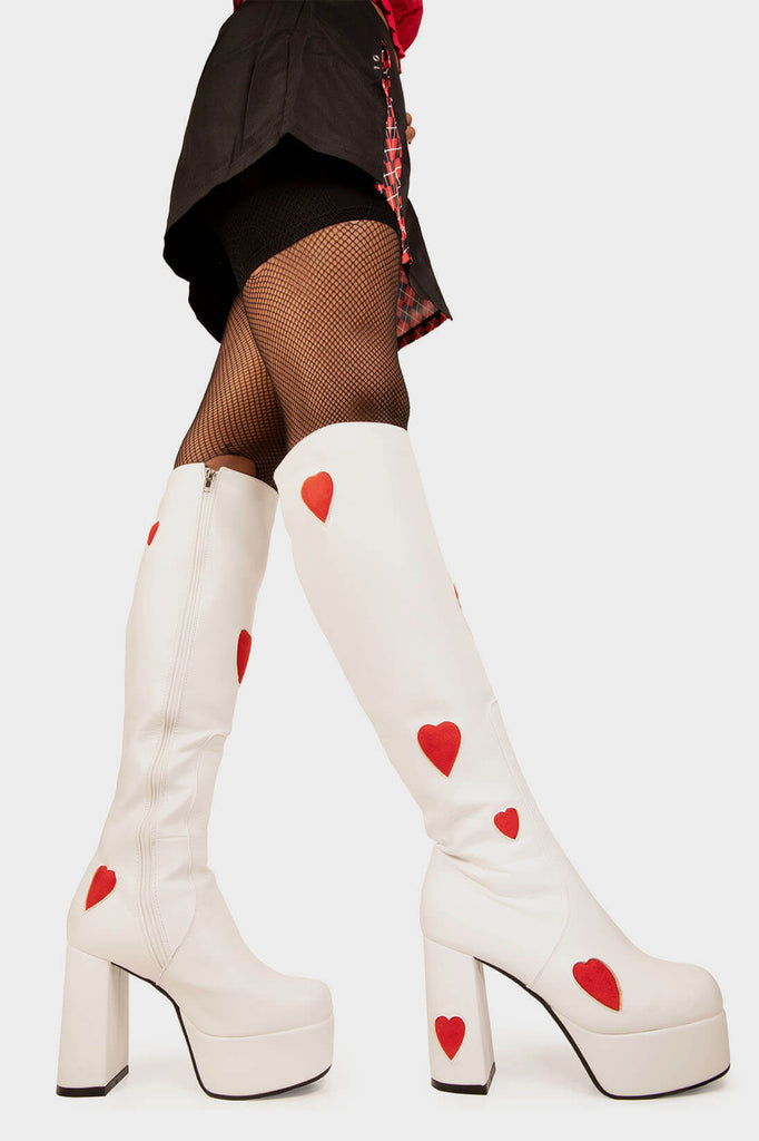 THE ONE FROM INSTA'

Jam Tarts Platform Knee High Boots in White faux leather. These White vegan Boots feature our ICONIC Red faux suede hearts and Platform sole and heel, perfect for adding height and style to any outfit. Made with eco-friendly materials and 100% cruelty-free, these boots are as ethical as they are cute!


- Platform Height: 1.25 inch
- Heel Height: 4.2 inch
- Knee High length
- Red Hearts
- White zipper 
- Platform sole
- Round Toe
- 100% vegan 

SKU: LMF 0916 - White/RedHeart