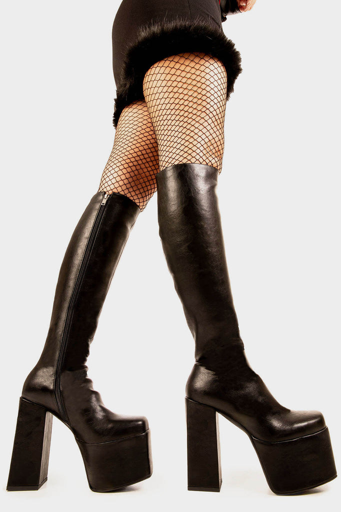 Sassy and Classy
  
  Obsession Wide Calf Platform Boots in Black faux leather. These black vegan Platform Boots feature on our chunky platform sole, perfect for any occasion. Made with eco-friendly materials and 100% cruelty-free, these platform boots are as ethical as they are fabulous.
  
  
  - Platform Height: 2.5 inch
  - Heel Height: 5.5 inch 
  - Black zipper 
  - Wide fit
  - Chunky Platform sole
  - Round Toe
  - 100% vegan 
  
  SKU: LMF 1897 - BlackPU - WIDE FIT