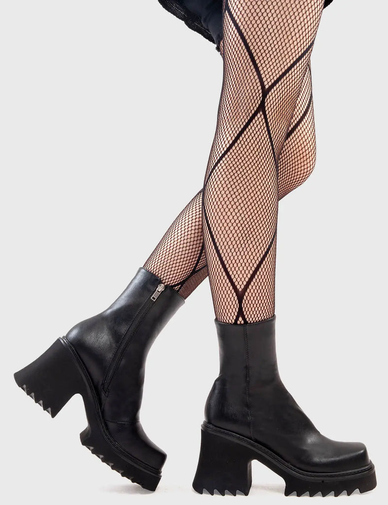 Anything But Basic
  
  Old Friend Chunky Platform Ankle Boots in Black faux leather. These platform boots feature an elegant, minimalist design, the perfect way to elevate any outfit. Made with eco-friendly materials and 100% cruelty-free, these platform boots are as ethical as they are cool.
  
  - Platform Height
  - Heel Height 
  - Black Zip
  - Shark's teeth grip
  - Chunky Platform sole
  - 100% vegan 
  
  SKU: LMF 2910 - BlackPU