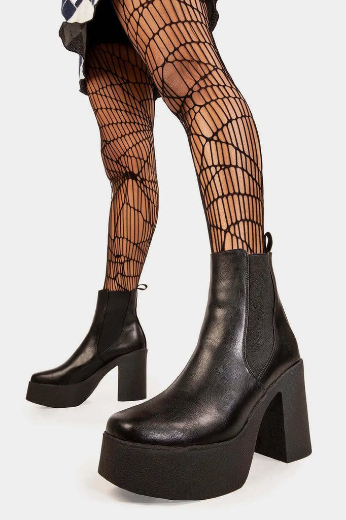 TIME TO LEVEL UP 
 
 Pick N Mix Platform Ankle Boots in Black faux leather. These faux suede vegan Boots feature an elastic gusset and our rubber Platform sole, making them the perfect comfy Boots for any occasion. Made with eco-friendly materials and 100% cruelty-free, these boots are as ethical as they are comfy!
 
 
 - Platform Height: 1.25 inch
 - Heel Height: 4 inch
 - Low ankle height
 - Black elastic gusset
 - Black pull tab
 - Platform sole
 - Square toe 
 - 100% vegan 
 
 SKU: LMF 0806 - BlackPU