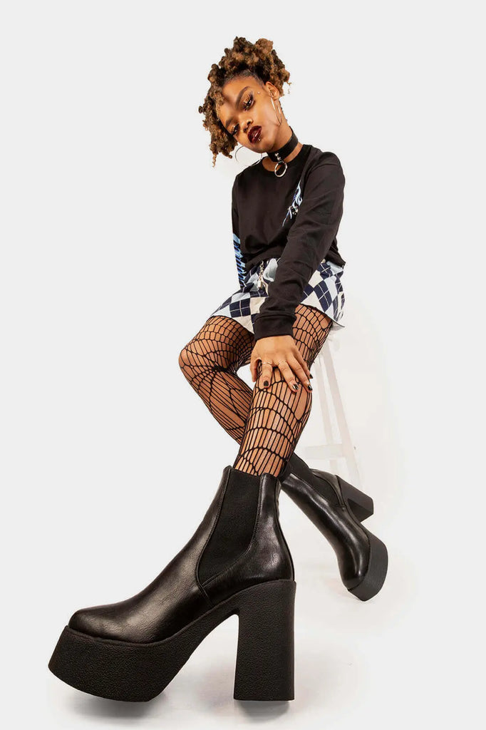 TIME TO LEVEL UP 
 
 Pick N Mix Platform Ankle Boots in Black faux leather. These faux suede vegan Boots feature an elastic gusset and our rubber Platform sole, making them the perfect comfy Boots for any occasion. Made with eco-friendly materials and 100% cruelty-free, these boots are as ethical as they are comfy!
 
 
 - Platform Height: 1.25 inch
 - Heel Height: 4 inch
 - Low ankle height
 - Black elastic gusset
 - Black pull tab
 - Platform sole
 - Square toe 
 - 100% vegan 
 
 SKU: LMF 0806 - BlackPU