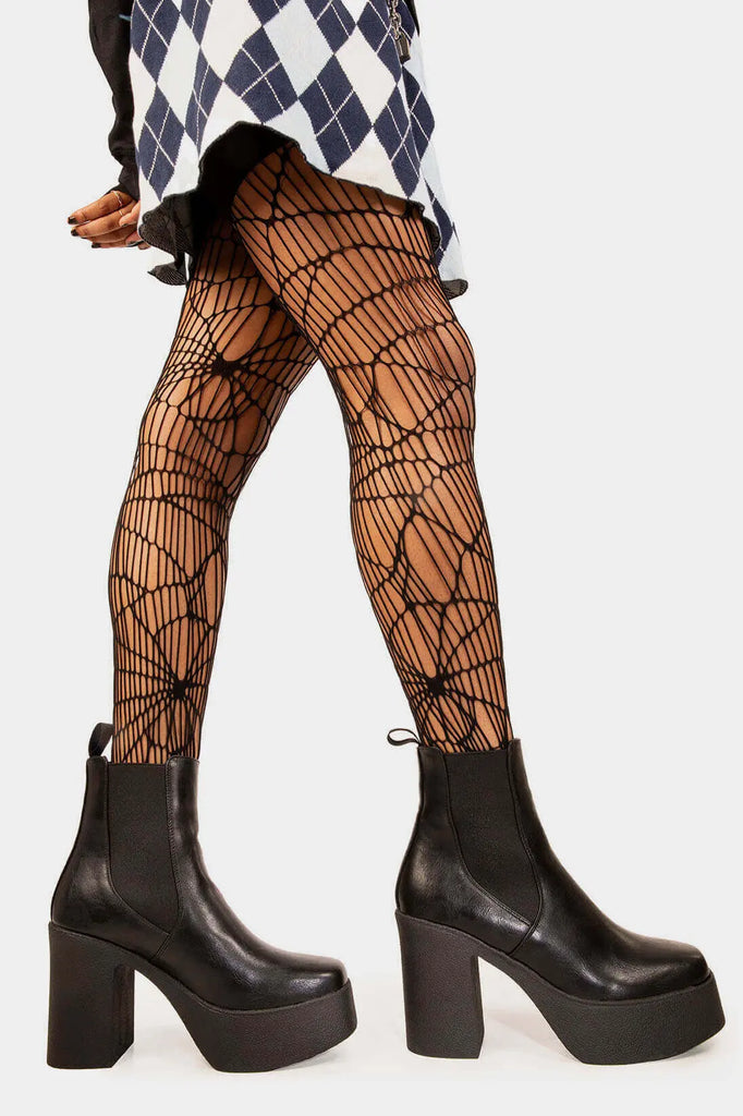 TIME TO LEVEL UP 
 
 Pick N Mix Platform Ankle Boots in Black faux leather. These faux suede vegan Boots feature an elastic gusset and our rubber Platform sole, making them the perfect comfy Boots for any occasion. Made with eco-friendly materials and 100% cruelty-free, these boots are as ethical as they are comfy!
 
 
 - Platform Height: 1.25 inch
 - Heel Height: 4 inch
 - Low ankle height
 - Black elastic gusset
 - Black pull tab
 - Platform sole
 - Square toe 
 - 100% vegan 
 
 SKU: LMF 0806 - BlackPU