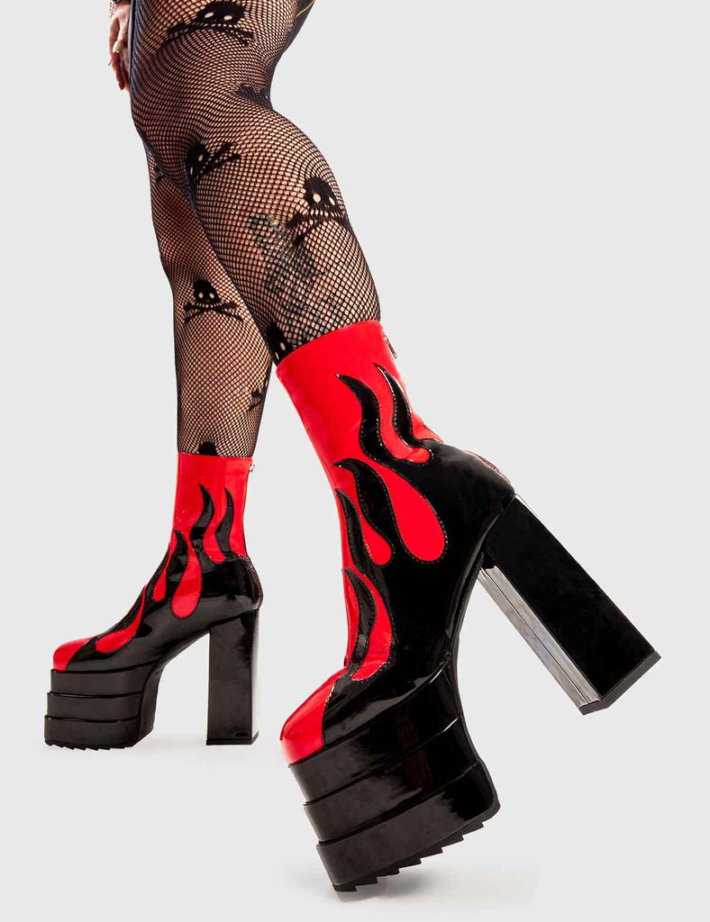 Set Things on Fire
  
  Reborn Platform Ankle Boots in Red faux leather. These platform boots feature a black flame design on our triple stack platform sole. Made with eco-friendly materials and 100% cruelty-free, these platform boots are as ethical as they are Fire.
  
  - Platform Height
  - Heel Height
  - Black zip
  - Flame design
  - High Heel
  - Triple Stack platform sole
  - 100% vegan 
  
  SKU: LMF 2998 - RedPU/Flame