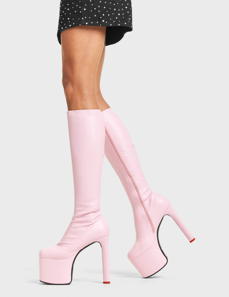 SHOWSTOPPER
  
  Rockstar Girlfriend Platform Knee High Boots in Pink faux leather. These platform boots feature a minimalist look with a stretchy construction. Features a heart shaped heel with a red heart at the bottom Made with eco-friendly materials and 100% cruelty-free, these platform boots are as ethical as they are chic.
  
  - Platform Height:
  - Heel Height: 
  - Knee high 
  - Red Heart
  - Heart heel
  - High Heel
  - 100% vegan 
  
  SKU: LMF 4646 - PinkStretchPU