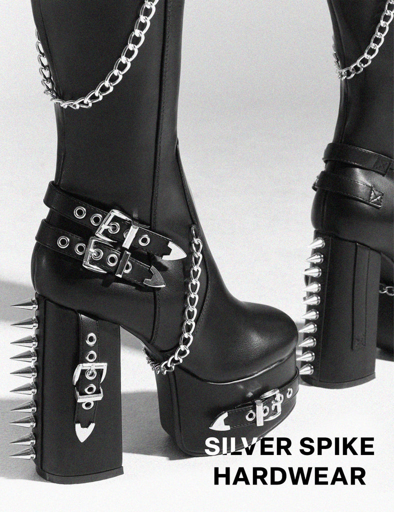 HERE AND NOW
  
  Scream Wide Calf Platform Thigh High Boots in Black faux leather. These vegan Boots feature Silver buckles, chains and spikes, making them the perfect comfy Boots. Made with eco-friendly materials and 100% cruelty-free, these boots are as ethical as they are comfy!
  
  
  - Thigh High length 
  - Silver spikes
  - Silver chains
  - Silver buckles
  - Skull face
  - Cunky Platform sole
  - Round toe 
  - 100% vegan 
  
  SKU: LMF 0988 - BlackPU - WIDE FIT