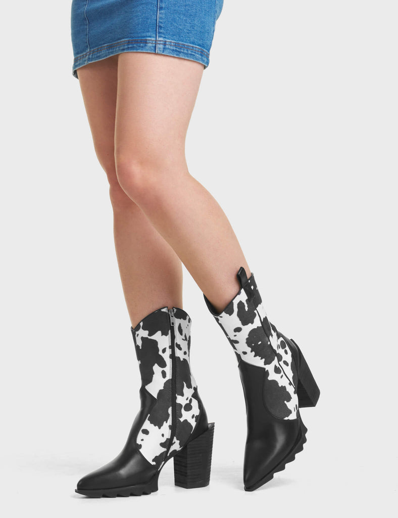Seen Before Western Ankle Boots, These Ankle Boots feature a cute cow print design, and features a signature western block heel.
