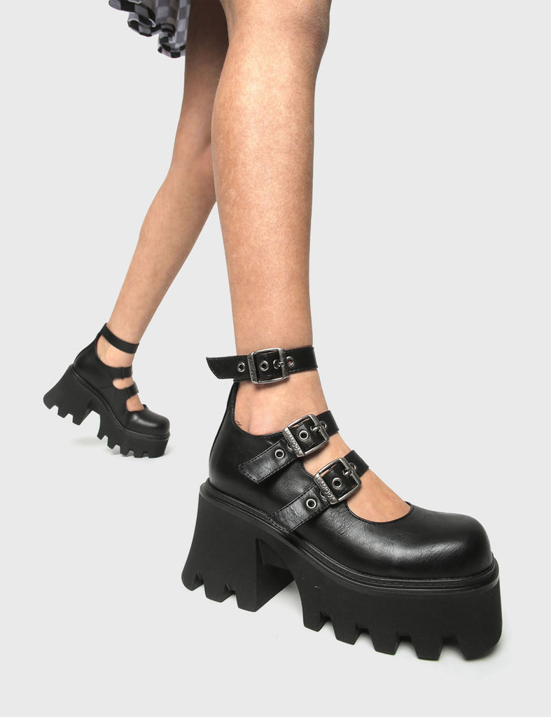 CAN IT GET ANY CUTER?
  
  Sprits Chunky Mary Jane Shoes in Black faux leather. These Mary Janes feature a Chunky and comfortable Platform sole. Everyone needs a pairs of Mary Janes! Made with eco-friendly materials and 100% cruelty-free, these Mary Janes are as ethical as they are cute!
  
  
  - Platform Height: 3.3 inch
  - Adjustable straps
  - Square shaped buckles and silver eyelets
  - Chunky Platform sole
  - Round toe 
  - 100% vegan 
  
  SKU: LMF 1099 - BlackPU