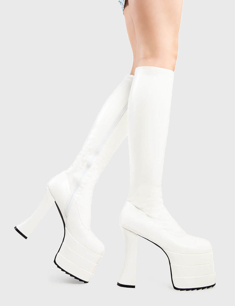 Trend Setter

Unfaithful Promises Platform Knee High Boots in White faux leather. These platform boots feature an elegant, minimalist design with a curved heel on our triple-stack sole, the perfect way to elevate any look. Made with eco-friendly materials and 100% cruelty-free, these platform boots are as ethical as they are Trendy.

- Platform Height
- Heel Height
- Stretchy
- Curved Heel
- Black Zip
- Triple-stack Sole
- Shark's teeth grip
- Chunky Platform sole
- 100% vegan 

SKU: LMF 2897 - WhitePU